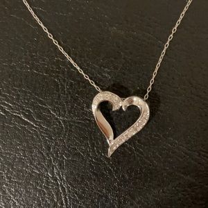 Beautiful sterling silver heart shape 1/10 ct TW Diamond necklace.